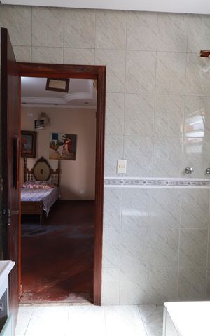 Casa à venda com 350m², 5 quartos e 4 vagasBanheiro da Suíte 3