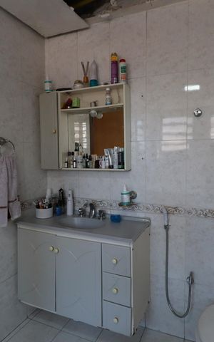Casa à venda com 350m², 5 quartos e 4 vagasBanheiro da Suíte 4