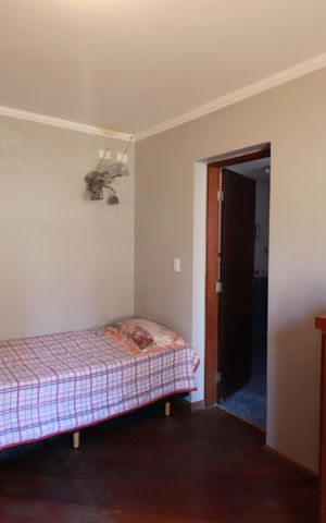 Casa à venda com 350m², 5 quartos e 4 vagasQuarto 2 - Suíte
