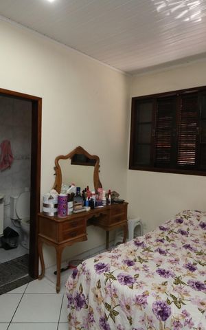 Casa à venda com 688m², 4 quartos e 5 vagasSuíte C2