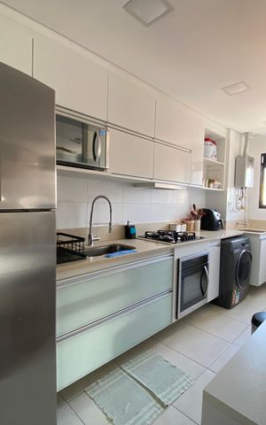 Apartamento à venda com 77m², 3 quartos e 1 vaga Apartamento à venda com 77m², 3 quartos e 1 vagaCozinha e Área de Serviço