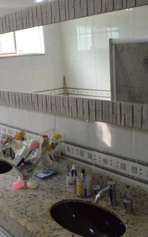 Casa de condomínio à venda com 367m², 4 quartos e 6 vagas Casa de condomínio à venda com 367m², 4 quartos e 6 vagasBanheiro da Suíte