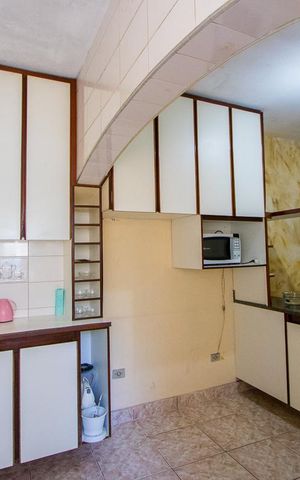 Casa à venda com 209m², 3 quartos e 2 vagas Casa à venda com 209m², 3 quartos e 2 vagasCozinha
