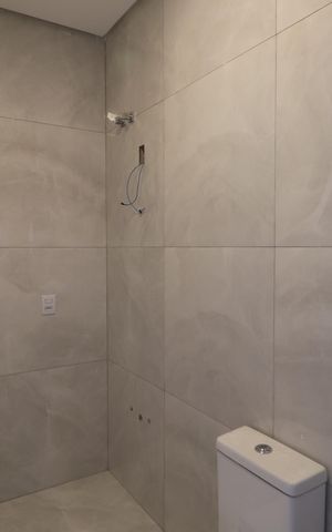 Casa à venda com 142m², 3 quartos e 2 vagasBanheiro da Suíte