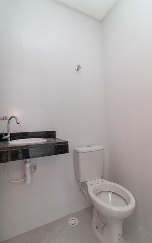 Casa de condomínio à venda com 91m², 2 quartos e 1 vagaBanheiro Social