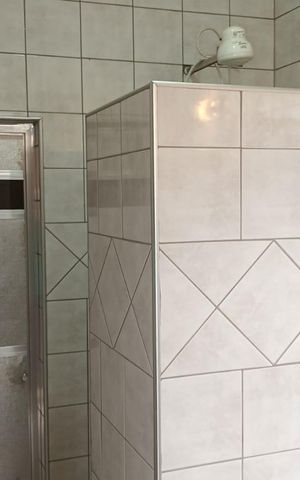 Casa de condomínio para alugar com 336m², 4 quartos e 4 vagas Casa de condomínio para alugar com 336m², 4 quartos e 4 vagasBanheiro 2