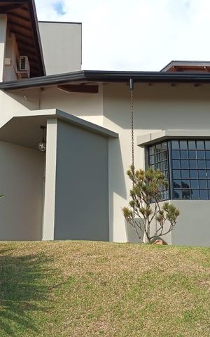Casa de condomínio para alugar com 336m², 4 quartos e 4 vagas Casa de condomínio para alugar com 336m², 4 quartos e 4 vagasFachada