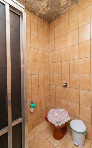 Casa à venda com 300m², 4 quartos e 2 vagasBanheiro da Suíte da Casa 02