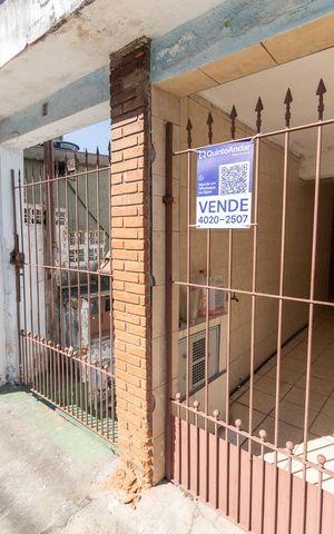 Casa à venda com 300m², 4 quartos e 2 vagasFachada + Plaquinha