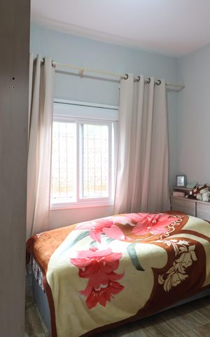 Casa à venda com 73m², 3 quartos e 2 vagasQuarto 1