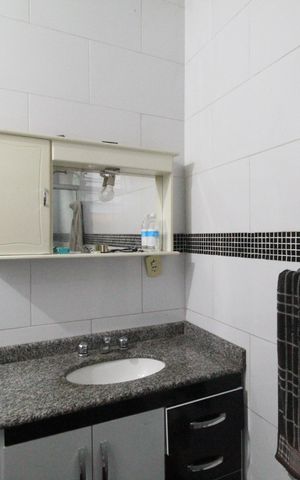Casa de condomínio à venda com 290m², 5 quartos e 3 vagasBanheiro social