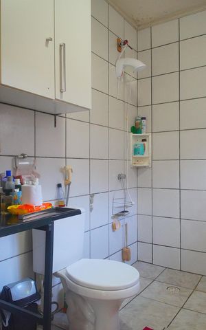 Casa à venda com 180m², 3 quartos e 4 vagasBanheiro da Suíte 1