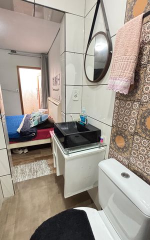 Casa à venda com 178m², 2 quartos e 3 vagas Casa à venda com 178m², 2 quartos e 3 vagasBanheiro da Suíte 1