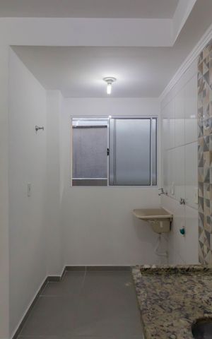 Casa de condomínio à venda com 30m², 1 quarto e sem vaga Casa de condomínio à venda com 30m², 1 quarto e sem vagaCozinha e Área de Serviço