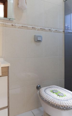 Casa de condomínio à venda com 72m², 2 quartos e 1 vaga Casa de condomínio à venda com 72m², 2 quartos e 1 vagaBanheiro da Suíte 1