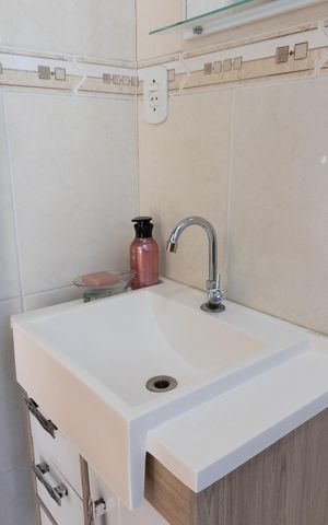 Casa de condomínio à venda com 72m², 2 quartos e 1 vaga Casa de condomínio à venda com 72m², 2 quartos e 1 vagaBanheiro da Suíte 1