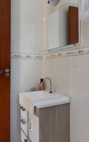 Casa de condomínio à venda com 72m², 2 quartos e 1 vaga Casa de condomínio à venda com 72m², 2 quartos e 1 vagaBanheiro da Suíte 1