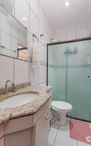 Casa à venda com 110m², 3 quartos e 2 vagasBanheiro da Suíte