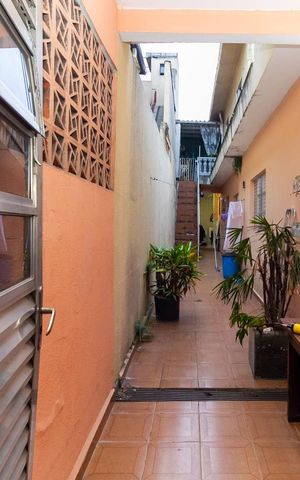 Casa à venda com 70m², 3 quartos e 2 vagas Casa à venda com 70m², 3 quartos e 2 vagasCorredor Externo