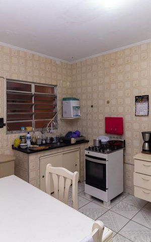 Casa à venda com 70m², 3 quartos e 2 vagas Casa à venda com 70m², 3 quartos e 2 vagasCasa 1 - Cozinha