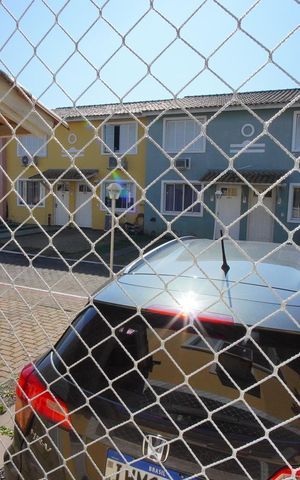 Casa de condomínio à venda com 72m², 3 quartos e 1 vagaSala - Vista