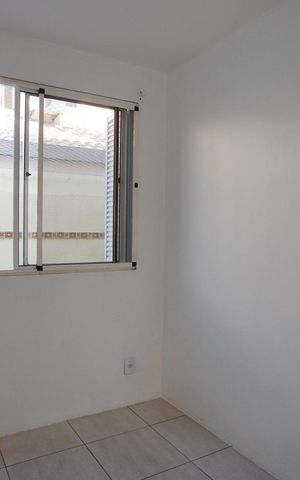 Casa de condomínio à venda com 72m², 3 quartos e 1 vagaQuarto 1