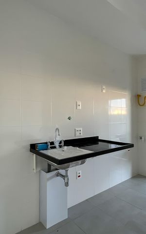 Apartamento à venda com 96m², 2 quartos e 1 vaga Apartamento à venda com 96m², 2 quartos e 1 vagaCozinha e Área de Serviço