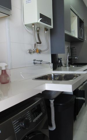 Apartamento à venda com 79m², 2 quartos e 2 vagasCozinha e Área de Serviço