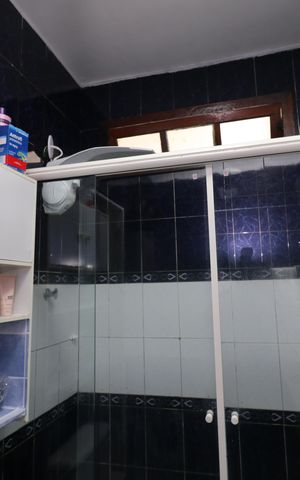 Casa à venda com 323m², 4 quartos e 3 vagasBanheiro da Suíte