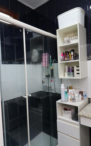 Casa à venda com 323m², 4 quartos e 3 vagasBanheiro da Suíte