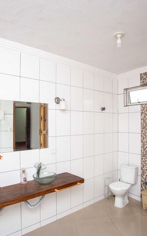 Casa à venda com 272m², 4 quartos e 3 vagasBanheiro da Suíte