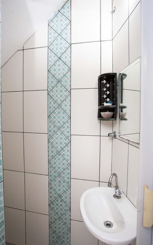 Casa à venda com 272m², 4 quartos e 3 vagasBanheiro de Serviço