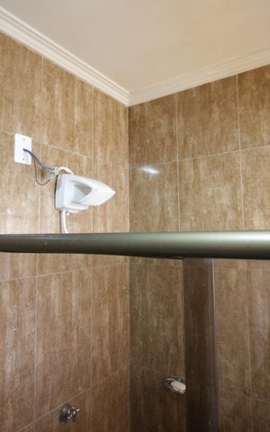 Casa à venda com 392m², 4 quartos e 3 vagasBanheiro da suíte