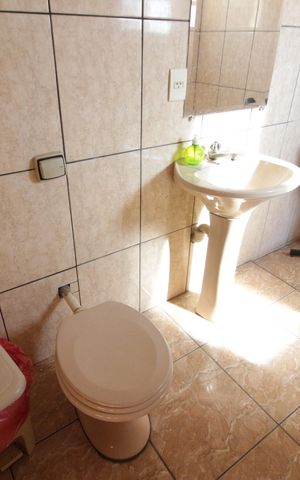 Casa à venda com 392m², 4 quartos e 3 vagasBanheiro de Serviço