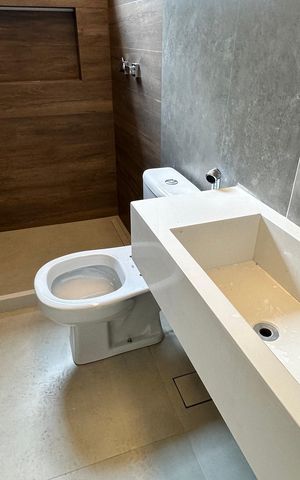 Casa à venda com 200m², 4 quartos e 2 vagas Casa à venda com 200m², 4 quartos e 2 vagasBanheiro da Suíte 2