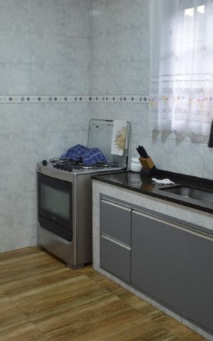 Casa à venda com 219m², 3 quartos e 3 vagas Casa à venda com 219m², 3 quartos e 3 vagasCozinha