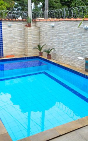 Casa à venda com 219m², 3 quartos e 3 vagas Casa à venda com 219m², 3 quartos e 3 vagasPiscina