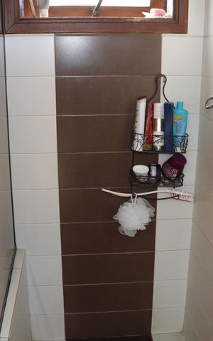 Casa de condomínio para alugar com 323m², 4 quartos e 5 vagasBanheiro da Suíte 2