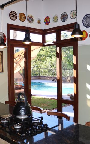 Casa de condomínio para alugar com 323m², 4 quartos e 5 vagasCozinha