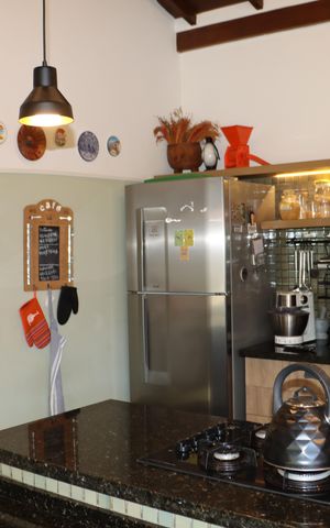Casa de condomínio para alugar com 323m², 4 quartos e 5 vagasCozinha