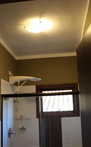 Casa de condomínio para alugar com 323m², 4 quartos e 5 vagasBanheiro da Suíte 3