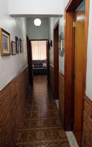 Casa à venda com 150m², 3 quartos e 3 vagasCorredor