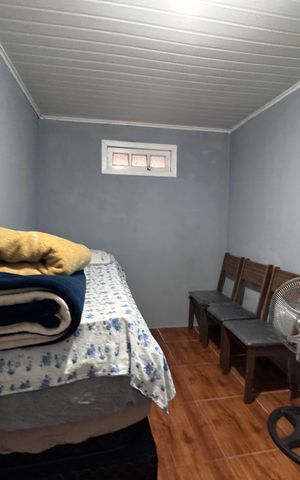 Casa à venda com 120m², 3 quartos e 2 vagasQuarto 3