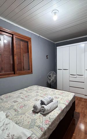 Casa à venda com 120m², 3 quartos e 2 vagasQuarto 2
