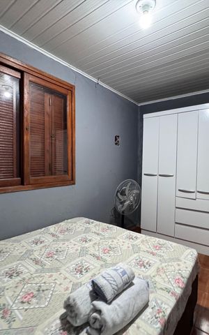 Casa à venda com 120m², 3 quartos e 2 vagasQuarto 2