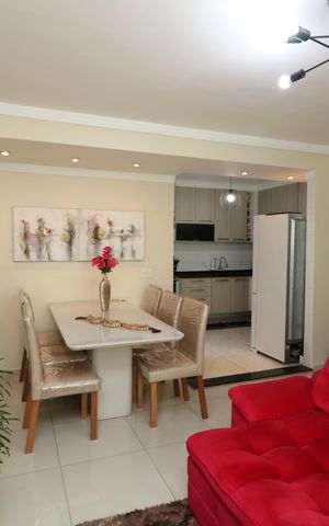 Casa de condomínio à venda com 123m², 2 quartos e 2 vagasSala