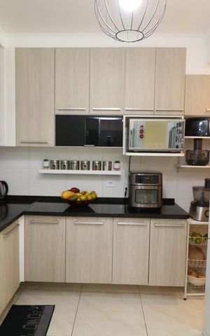 Casa de condomínio à venda com 123m², 2 quartos e 2 vagasCozinha