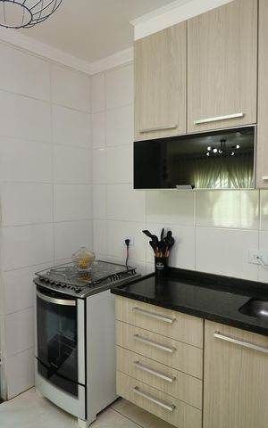 Casa de condomínio à venda com 123m², 2 quartos e 2 vagasCozinha