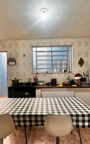 Casa à venda com 200m², 3 quartos e 3 vagas Casa à venda com 200m², 3 quartos e 3 vagasCozinha