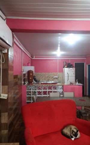 Casa à venda com 84m², 3 quartos e 2 vagasSala/Cozinha